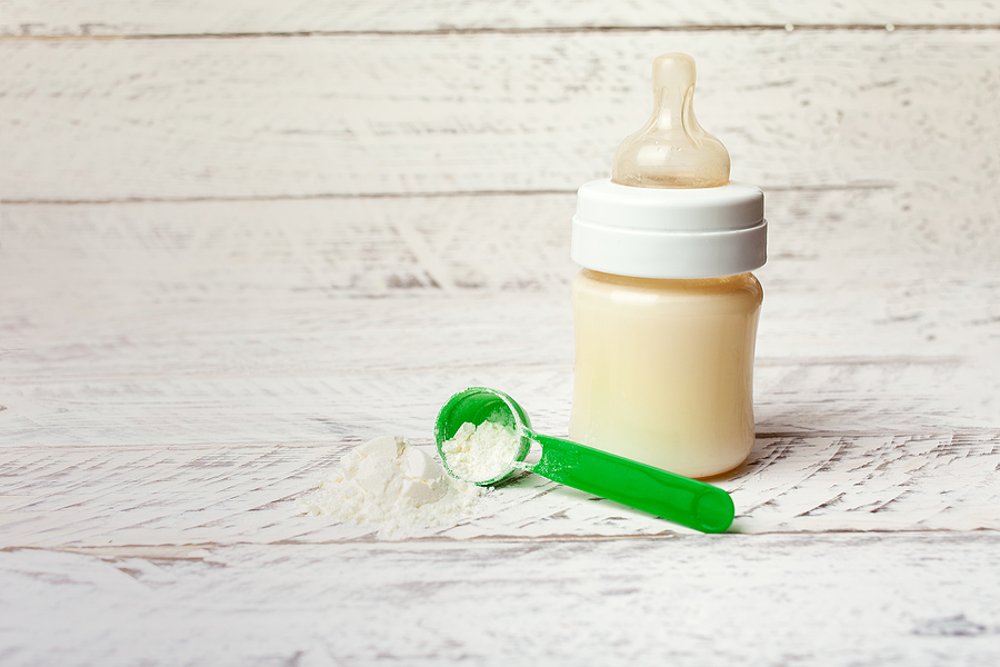 Baby bottle with dairy powder milk