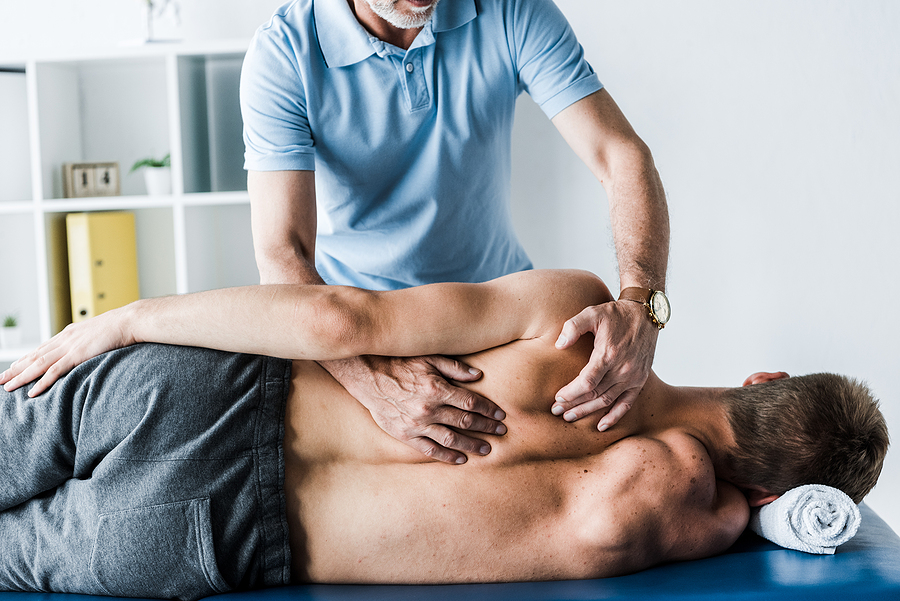 Chiropractor in Norwest treating a patient